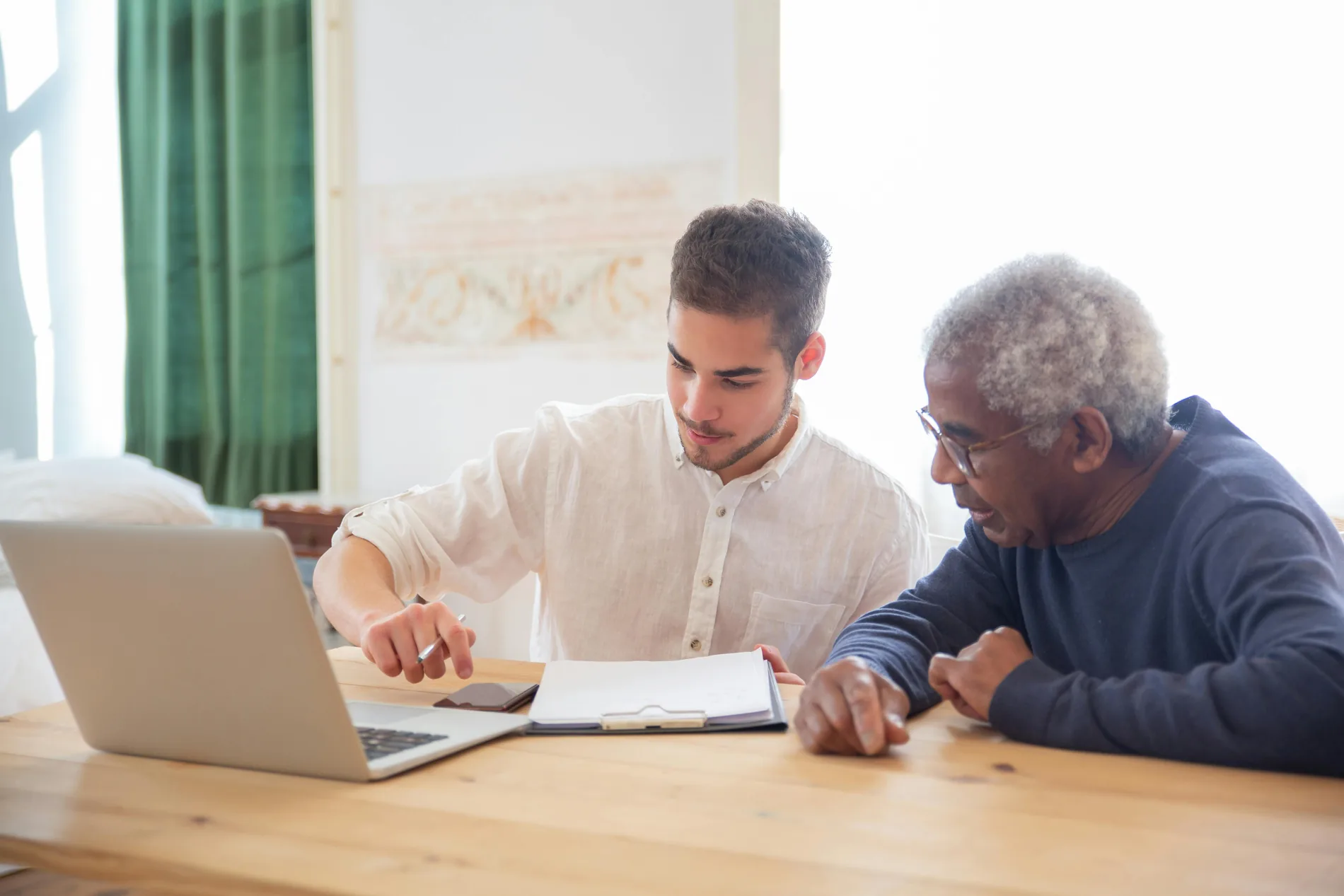 Celevia Care coordinator reviewing a care plan with a senior